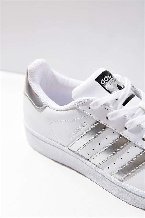 metallic stripe adidas shoes.